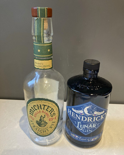 Two empty bottles for